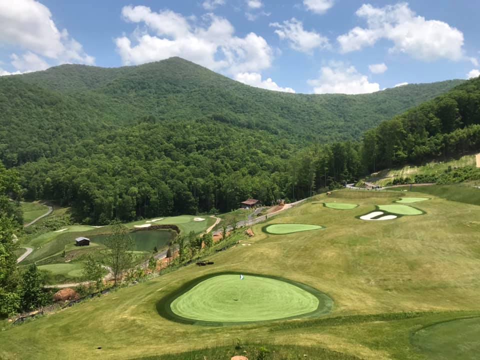 View of golf course overlooking hills
