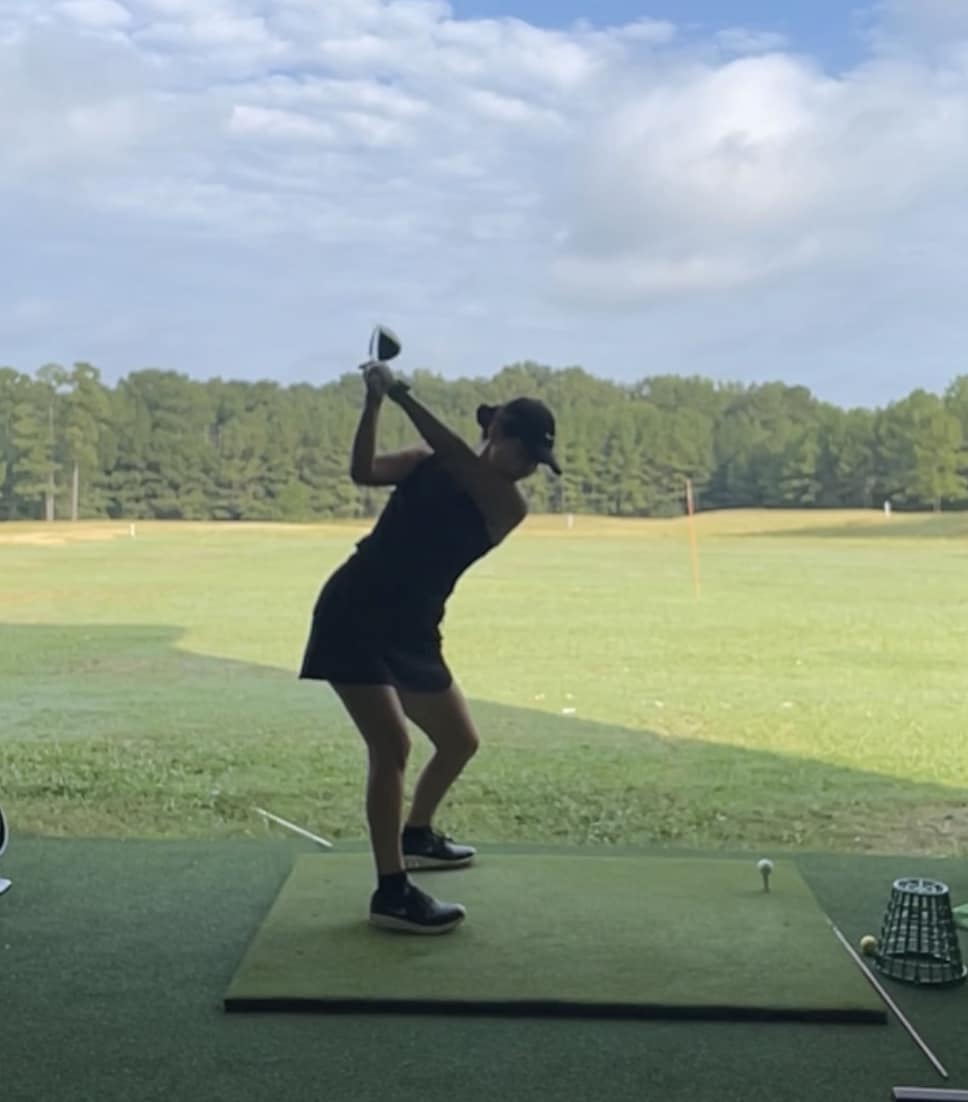 Golfer at practice range
